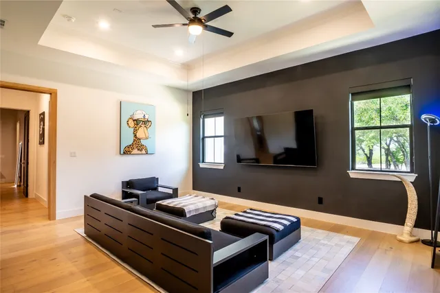 a large spacious bathroom with a bathtub and sink