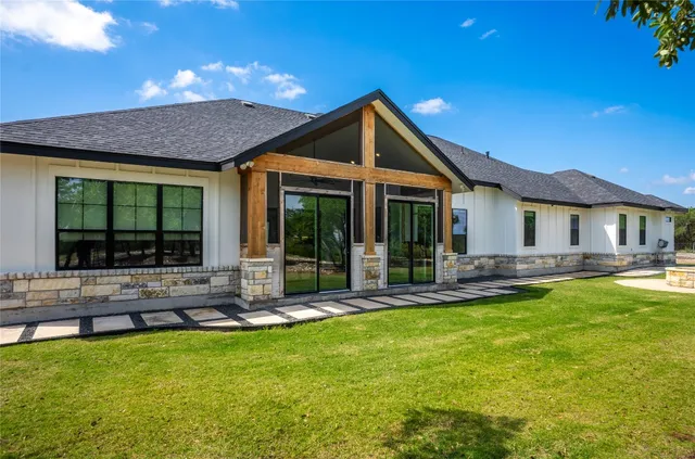 a view of backyard with green space