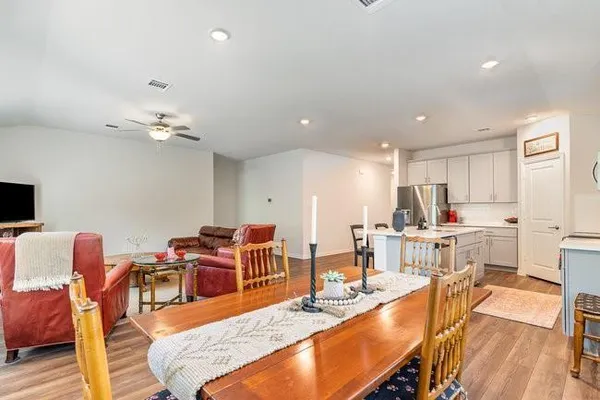 a living room with furniture and a table