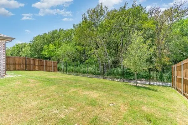 a view of a yard with a slide