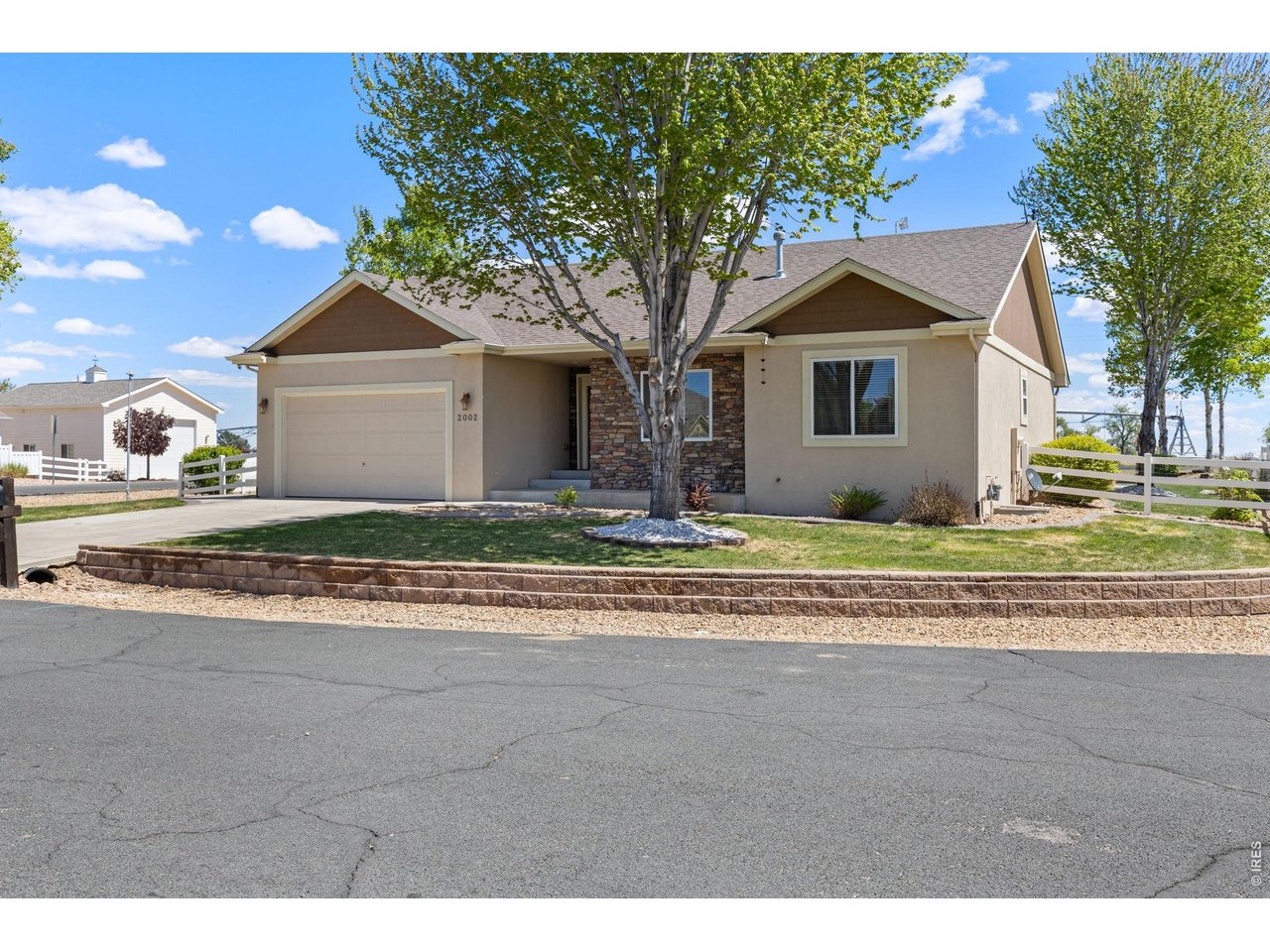 2002 Trail Ridge Drive Severance, CO 80615 - Photo 5 of 50 Situated on a private corner lot in a quiet cul-de-sac, this property backs to farm ground offering a peaceful, tucked-away feeling while still being conveniently close to town and ample amenities.