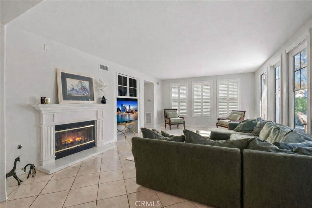 27053 Island Road Valencia, CA 91355 - Photo 15 of 57 Virtually Staged Great Room with Plantation Shutters