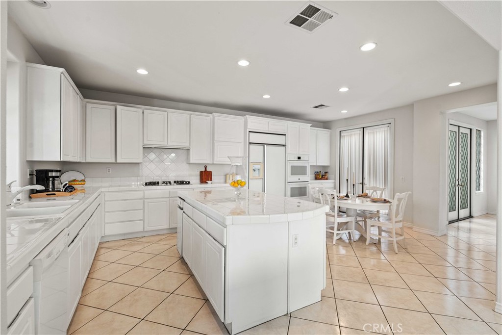 27053 Island Road Valencia, CA 91355 - Photo 18 of 57 Kitchen with Center Island