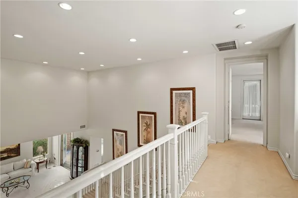 an aerial view of a house with a ocean view