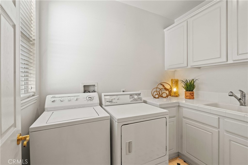 27053 Island Road Valencia, CA 91355 - Photo 38 of 57 Upstairs Laundry