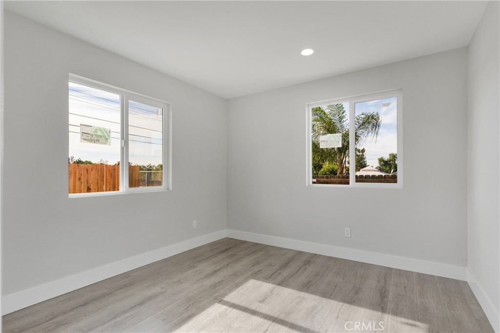 3308 Cannes Avenue Riverside, CA 92501 - Photo 22 of 38 an empty room with a window