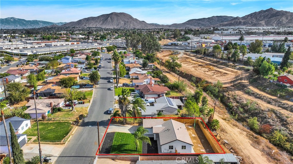 3308 Cannes Avenue Riverside, CA 92501 - Photo 32 of 38 an aerial view of residential house and sandy dunes