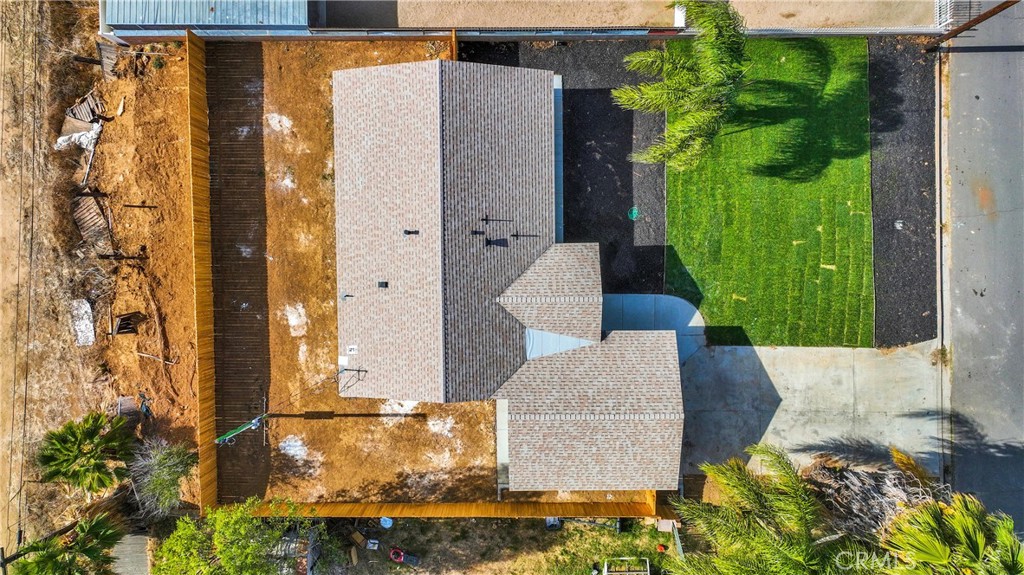 3308 Cannes Avenue Riverside, CA 92501 - Photo 37 of 38 aerial view of a house with a yard and potted plants