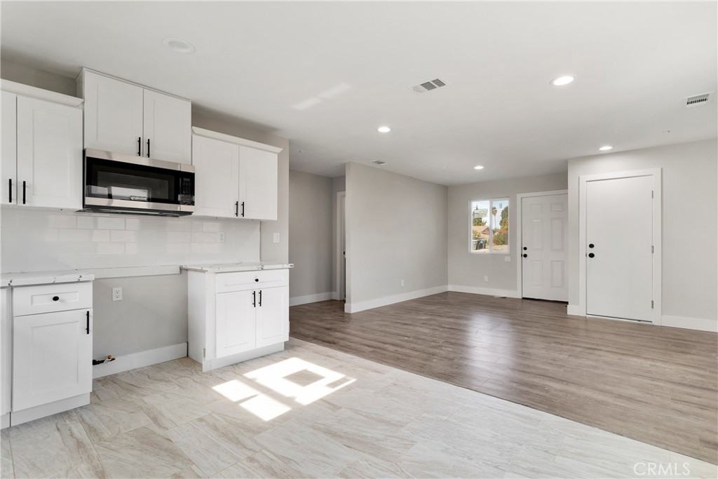 3308 Cannes Avenue Riverside, CA 92501 - Photo 10 of 38 a view of a kitchen with electric appliances and cabinets