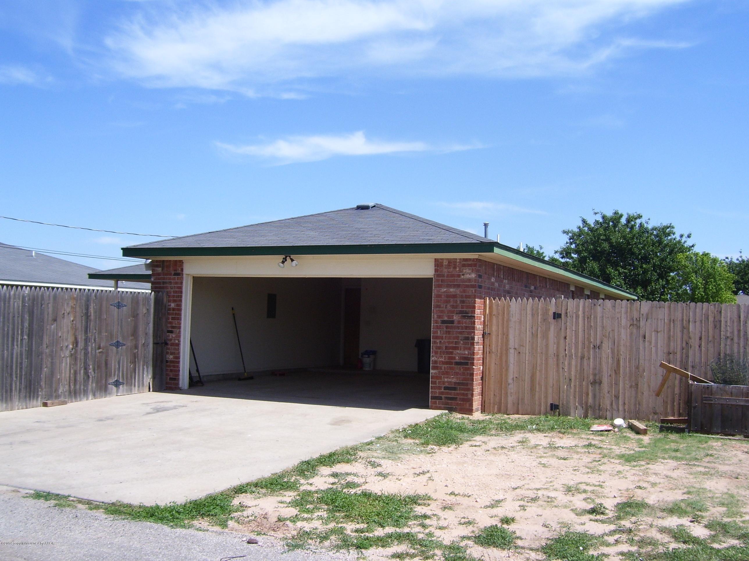 1164 Sterling Drive Amarillo, TX 79110 - Photo 23 of 24 a front view of a house with a garage