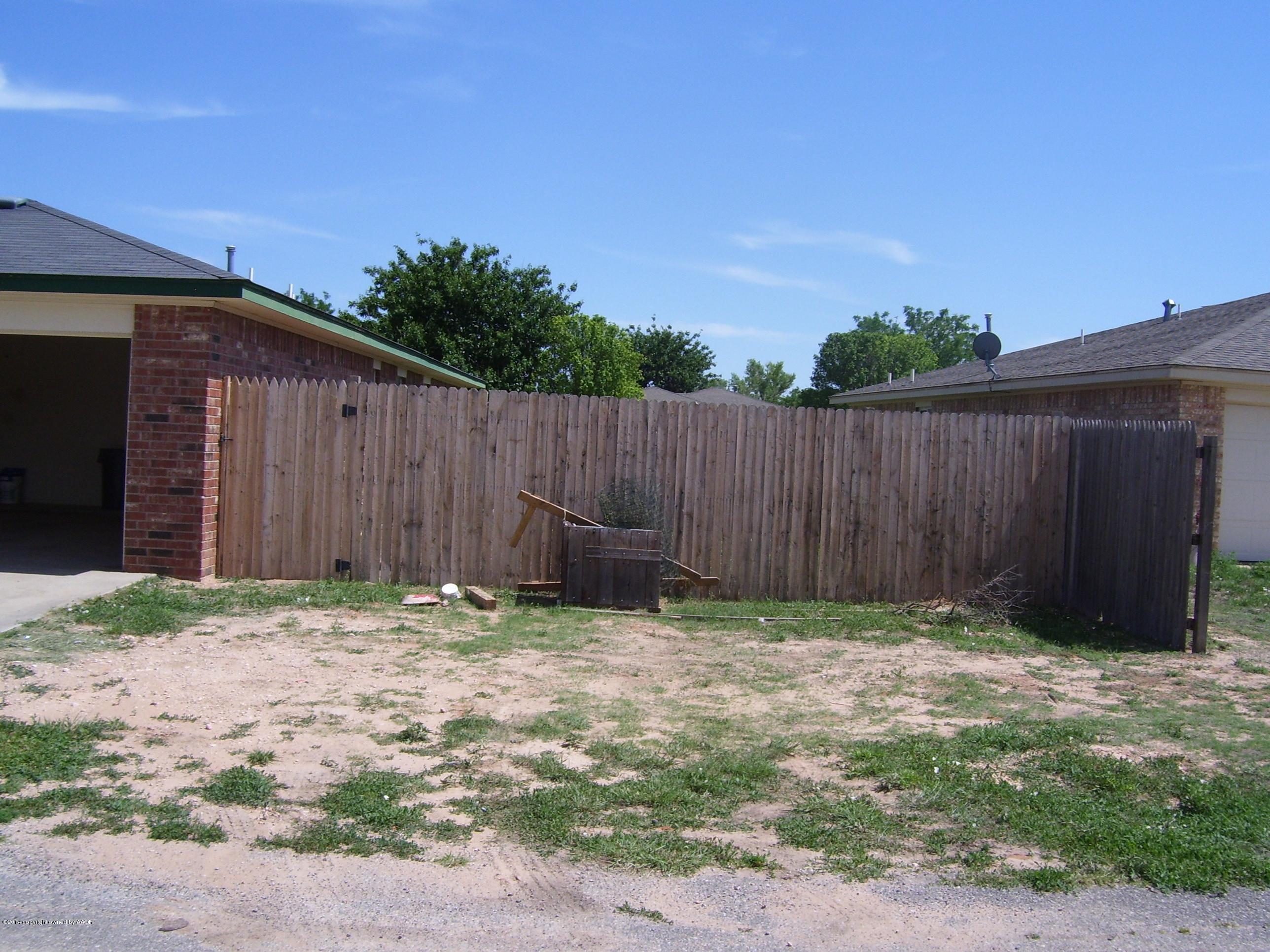 1164 Sterling Drive Amarillo, TX 79110 - Photo 24 of 24 a backyard of a house
