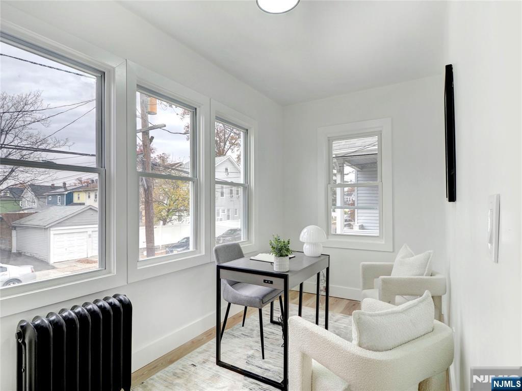 44 Laventhal Avenue Irvington, NJ 07111 - Photo 12 of 26 a dining room with furniture and windows