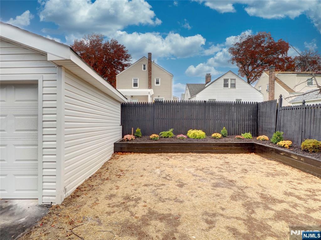 44 Laventhal Avenue Irvington, NJ 07111 - Photo 26 of 26 a view of a back yard with a patio