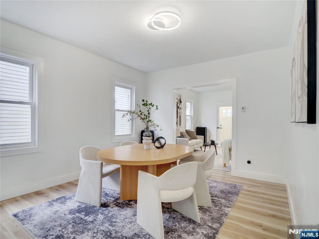 44 Laventhal Avenue Irvington, NJ 07111 - Photo 7 of 26 a view of a dining room with furniture