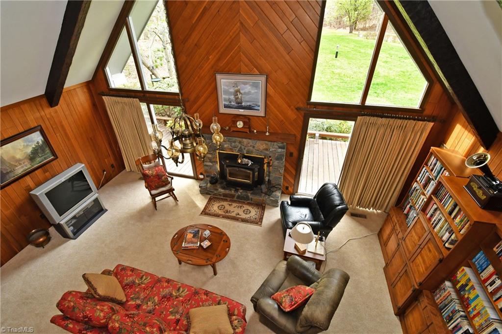 225 Cook Street Rural Hall, NC 27045 - Photo 13 of 30 Overlooking the den from the bonus room/office...what a view of the custom wood paneling features.