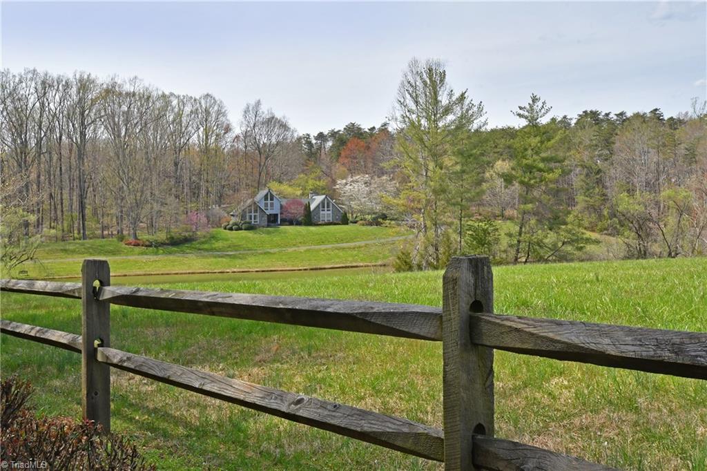 225 Cook Street Rural Hall, NC 27045 - Photo 3 of 30 These 18+ private and secluded acres are a spectacular setting for this beautiful home.