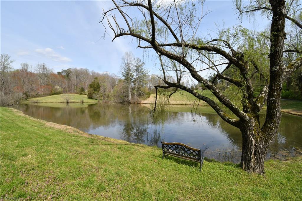 225 Cook Street Rural Hall, NC 27045 - Photo 4 of 30 Enjoy the serenity and peacefulness of the pond....catch your dinner!