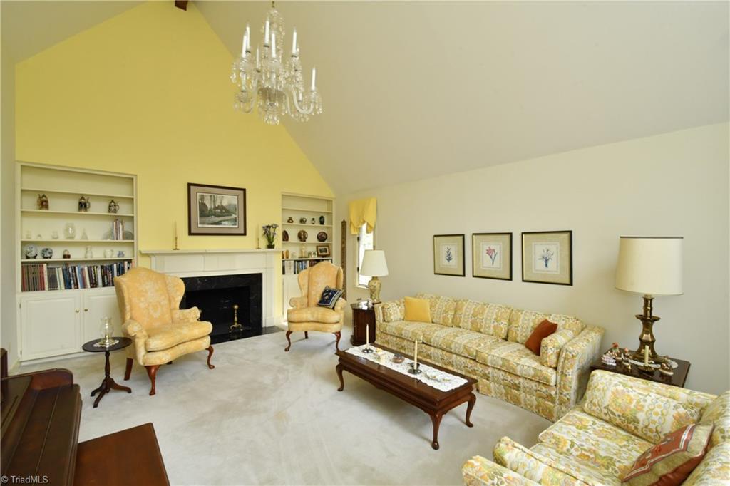 225 Cook Street Rural Hall, NC 27045 - Photo 7 of 30 Enjoy entertaining in this pretty Living Room with Fireplace & built-ins.