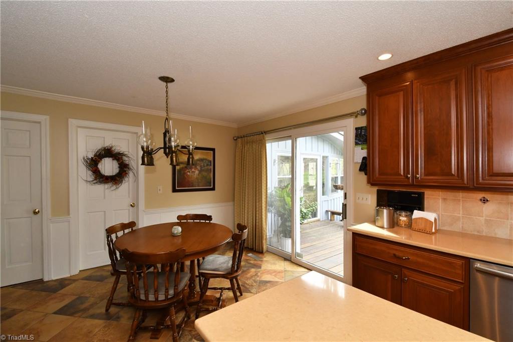 225 Cook Street Rural Hall, NC 27045 - Photo 10 of 30 Breakfast room offers easy access to a large deck for relaxing and outdoor grilling.