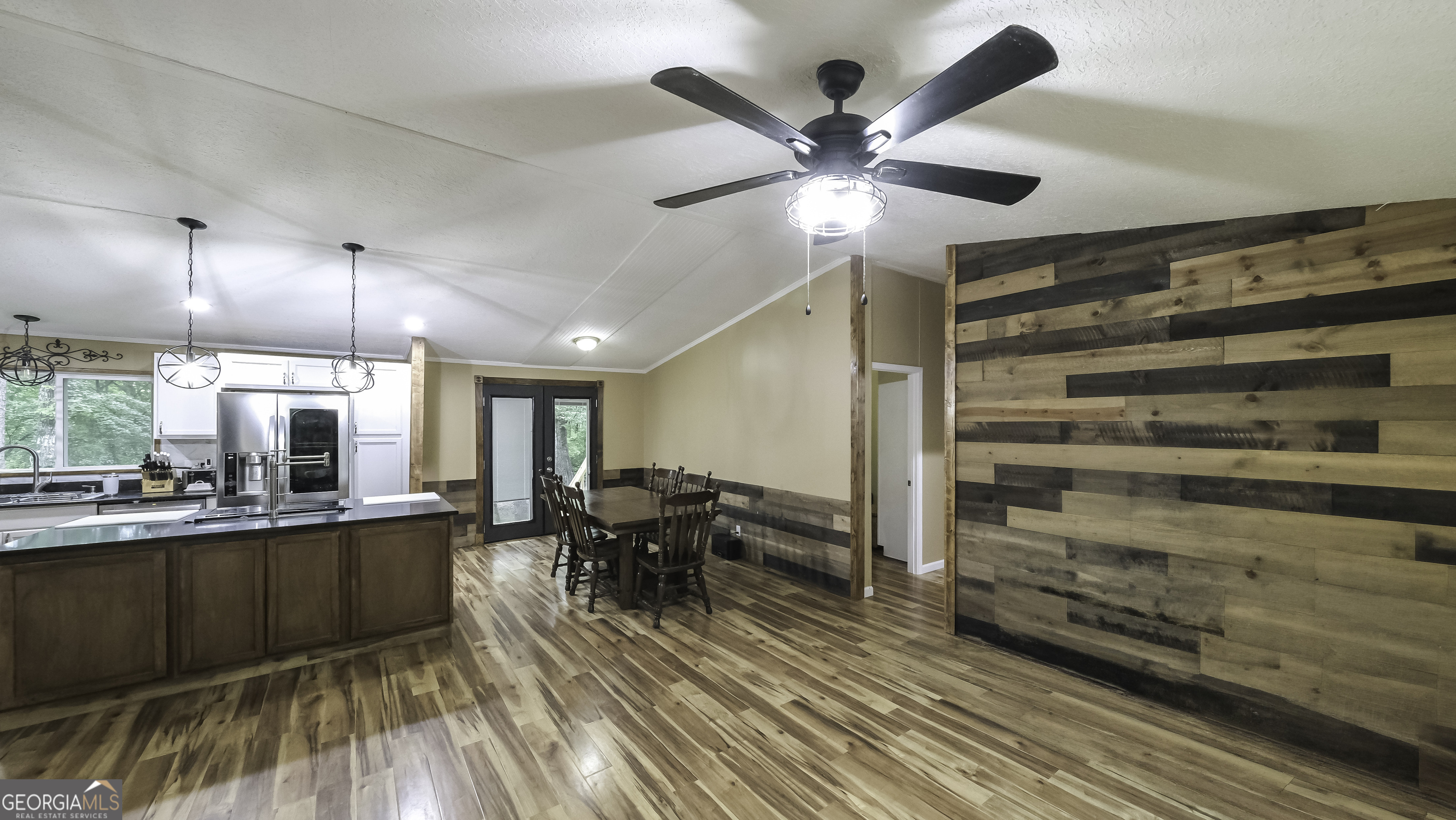 91 Holder Road Temple, GA 30179 - Photo 13 of 40 a living room with stainless steel appliances kitchen island granite countertop furniture and a kitchen view