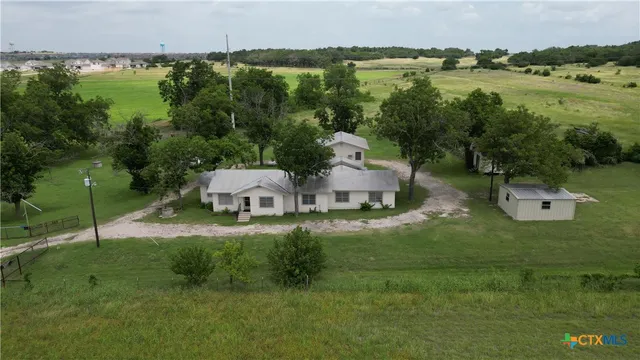 a view of a lake from a yard