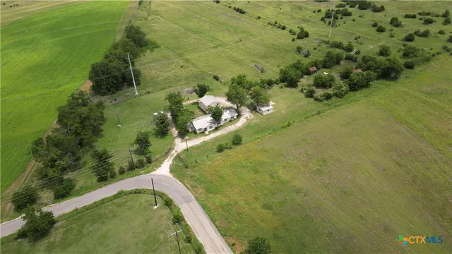 a view of a lake with a yard