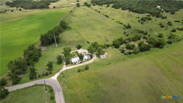 a view of a yard with an outdoor space