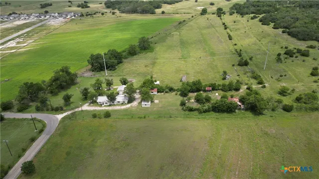 a view of a lake with a yard