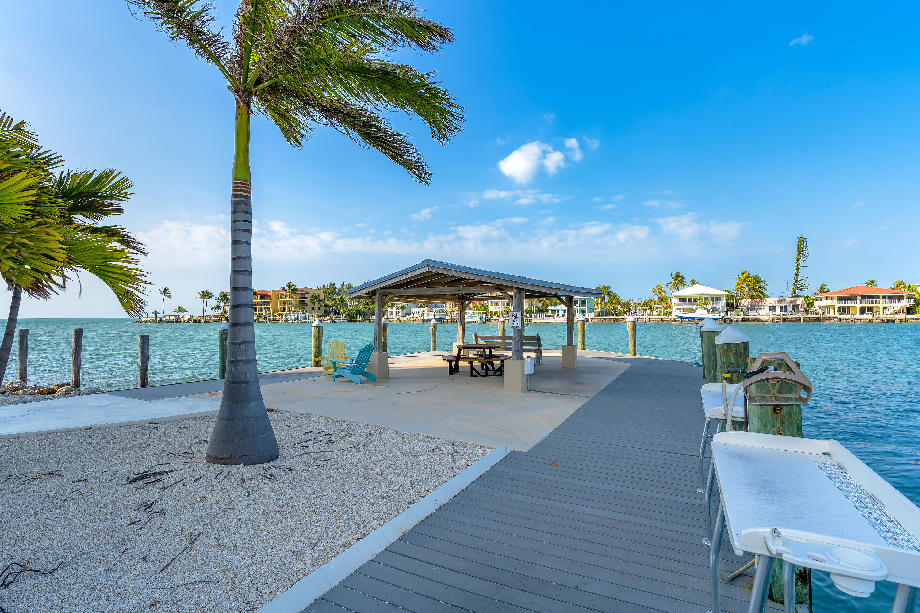 2000 Coco Plum Drive, Unit 203 Marathon, FL 33050 - Photo 27 of 44 Outside Seating & Fish Cleaning Area
