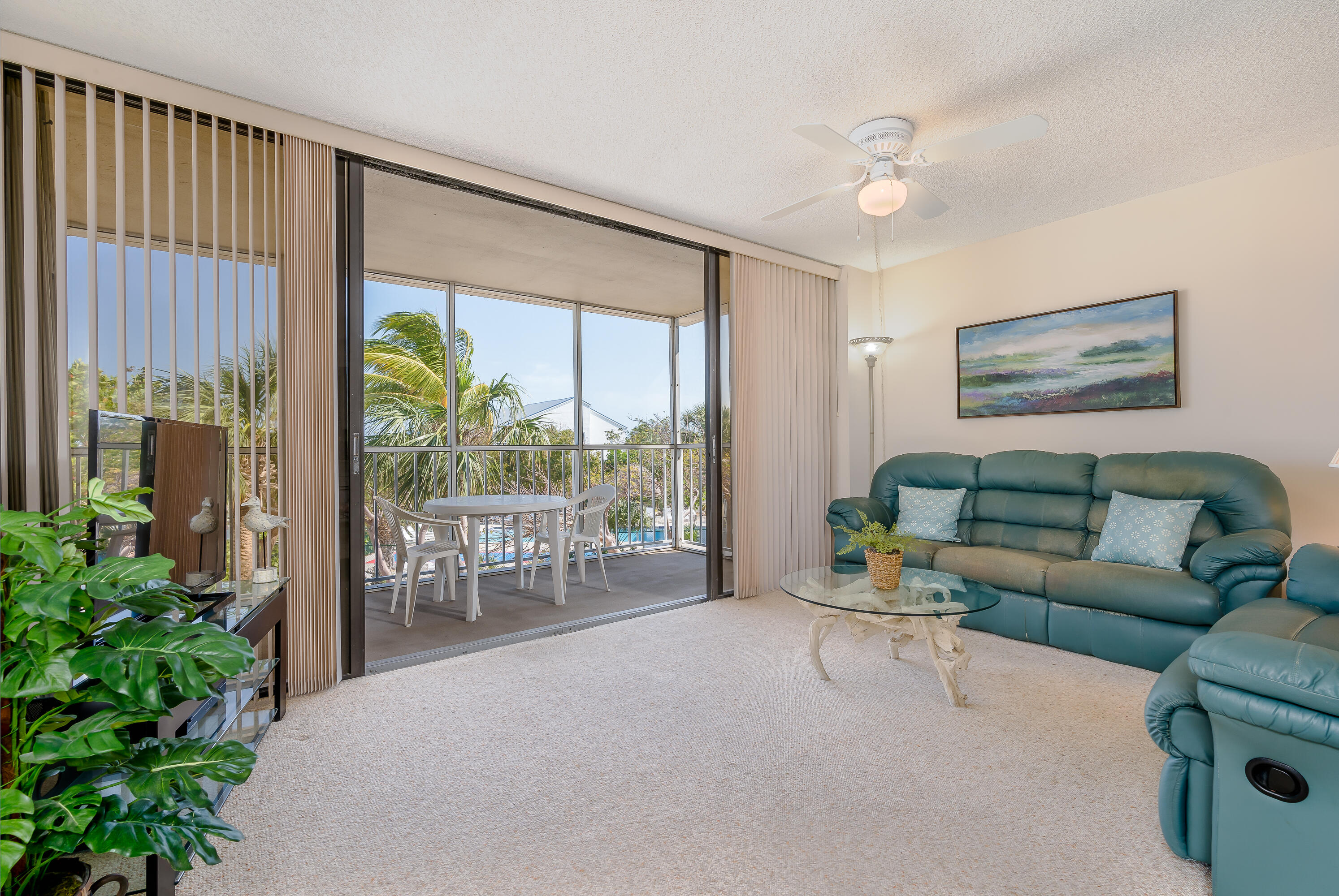 2000 Coco Plum Drive, Unit 203 Marathon, FL 33050 - Photo 10 of 44 Screened Porch off Living Room