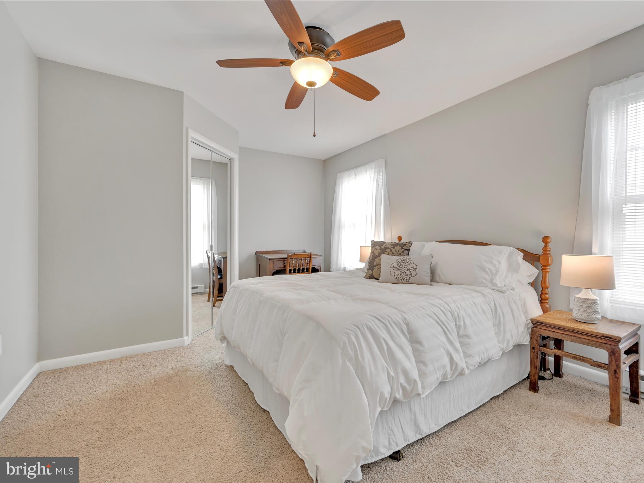28 Buttonwood Drive Lititz, PA 17543 - Photo 14 of 32 a bedroom with bed and a chandelier