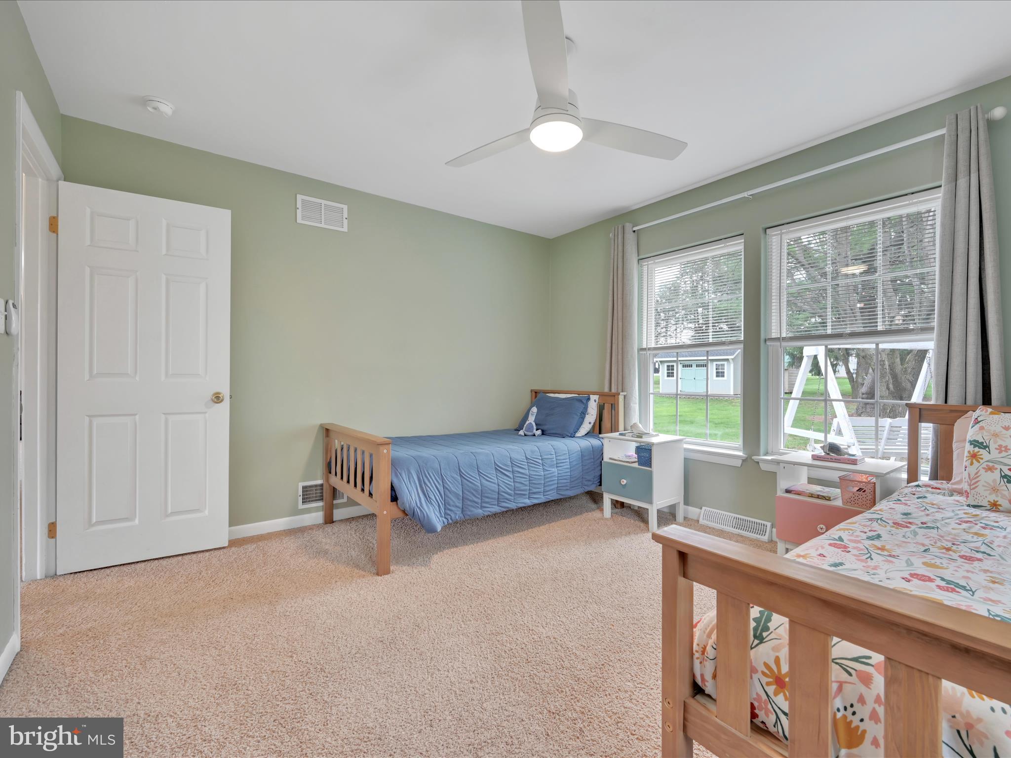 28 Buttonwood Drive Lititz, PA 17543 - Photo 20 of 32 a bedroom with furniture and a large window