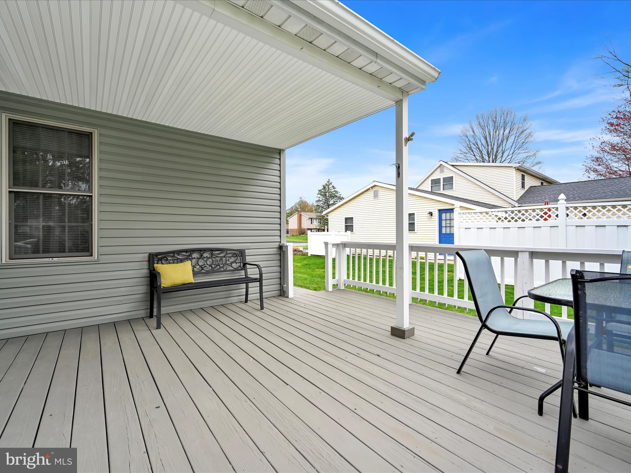 28 Buttonwood Drive Lititz, PA 17543 - Photo 27 of 32 a view of a chairs and table on the wooden deck