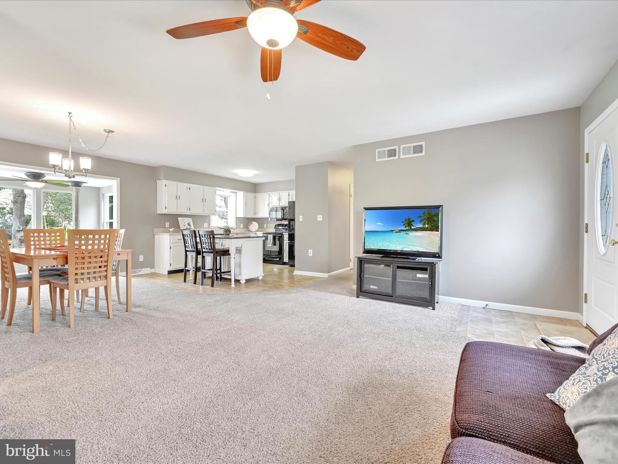 28 Buttonwood Drive Lititz, PA 17543 - Photo 5 of 32 a view of a livingroom with furniture and a flat screen tv