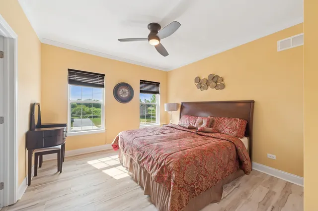 a front view of house with yard and outdoor seating