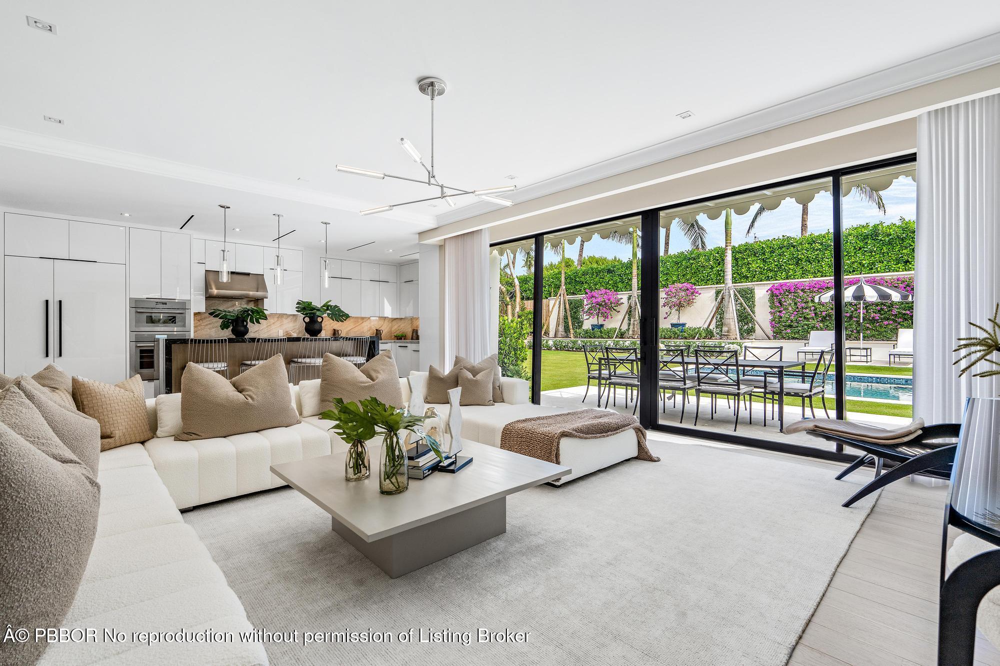 150 El Vedado Road Palm Beach, FL 33480 - Photo 16 of 77 a living room with furniture and a large window