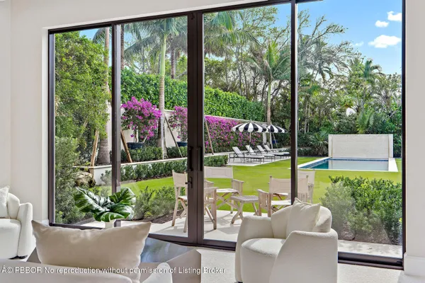 a bedroom with a bed and a desk