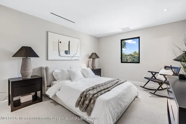 a view of house with swimming pool yard and outdoor seating