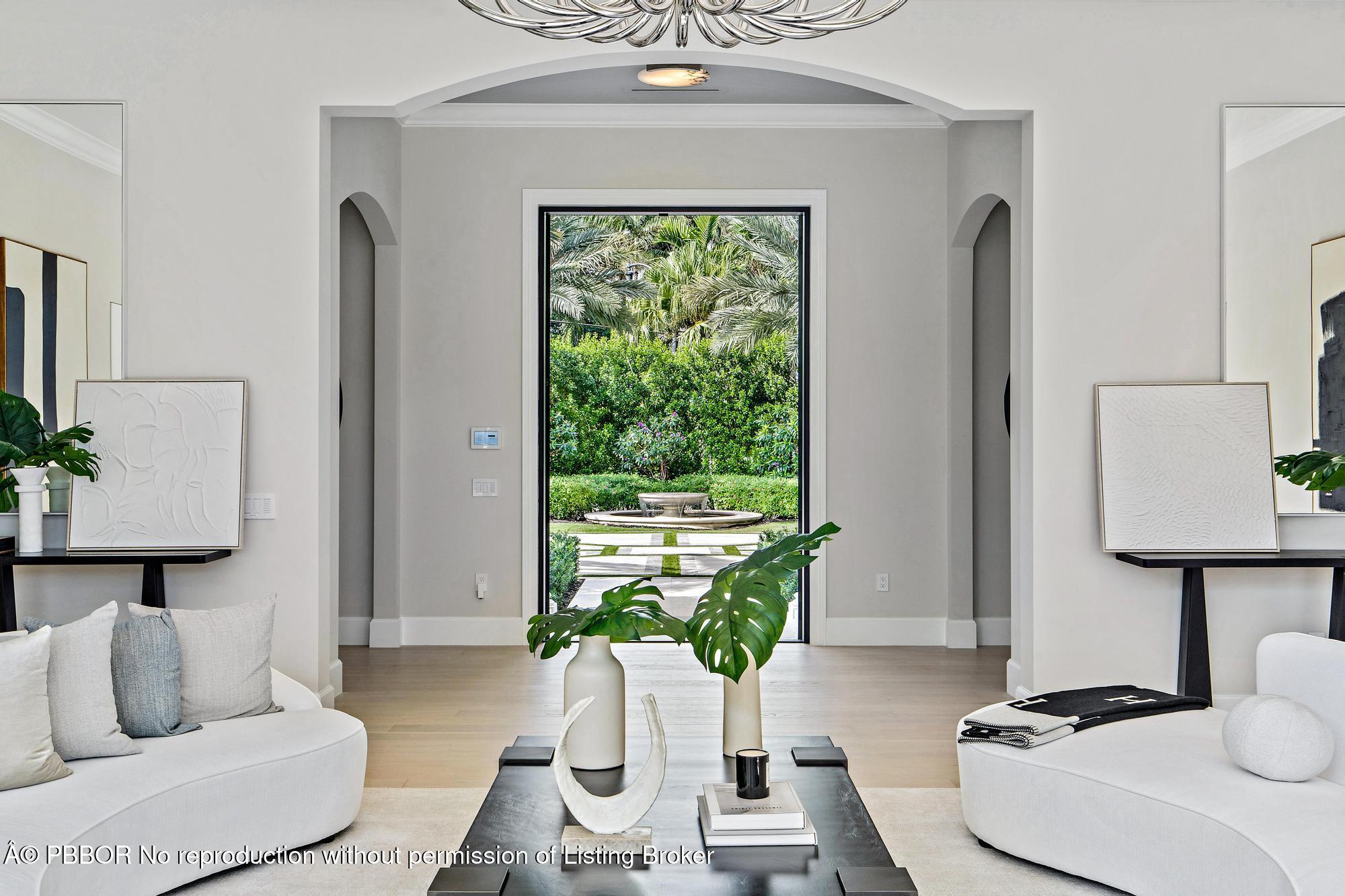 150 El Vedado Road Palm Beach, FL 33480 - Photo 4 of 77 a living room with furniture and a window