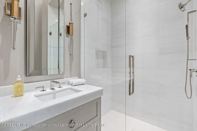a view of a house with a yard and potted plants