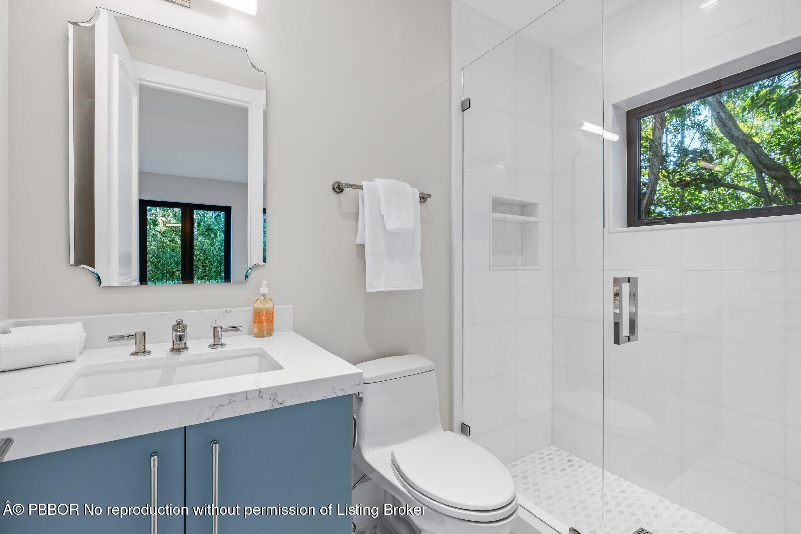 150 El Vedado Road Palm Beach, FL 33480 - Photo 44 of 77 a bathroom with a sink a toilet and shower