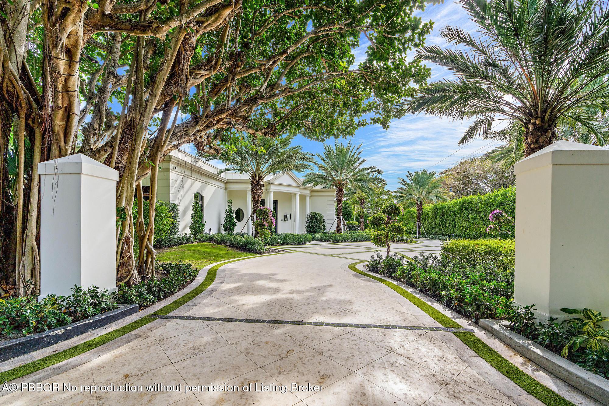 150 El Vedado Road Palm Beach, FL 33480 - Photo 59 of 77 a front view of a house with yard and green space