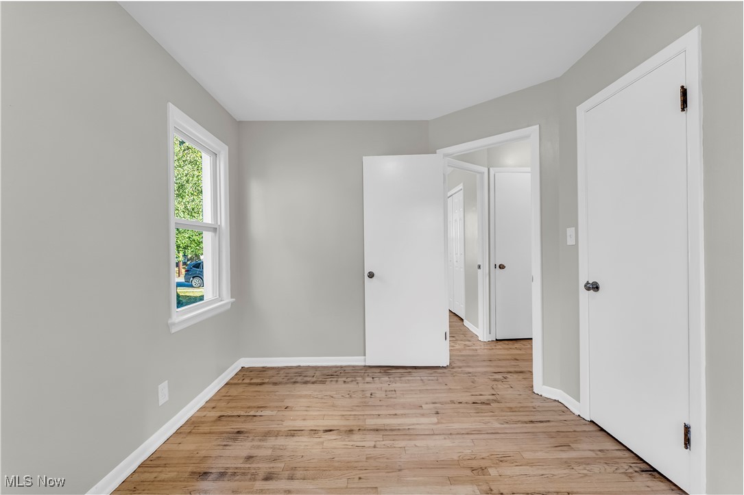 29034 Barjode Road Willowick, OH 44095 - Photo 10 of 24 Unfurnished bedroom with light wood finished floors and baseboards