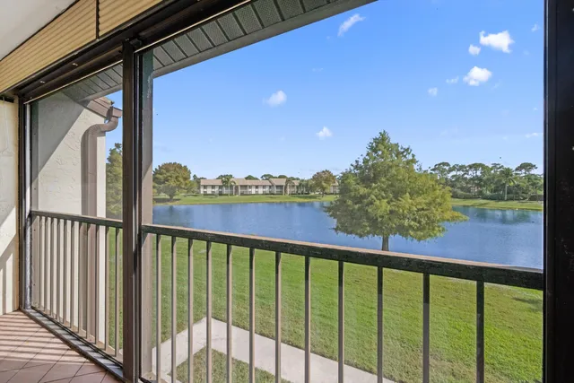 a view of balcony with furniture