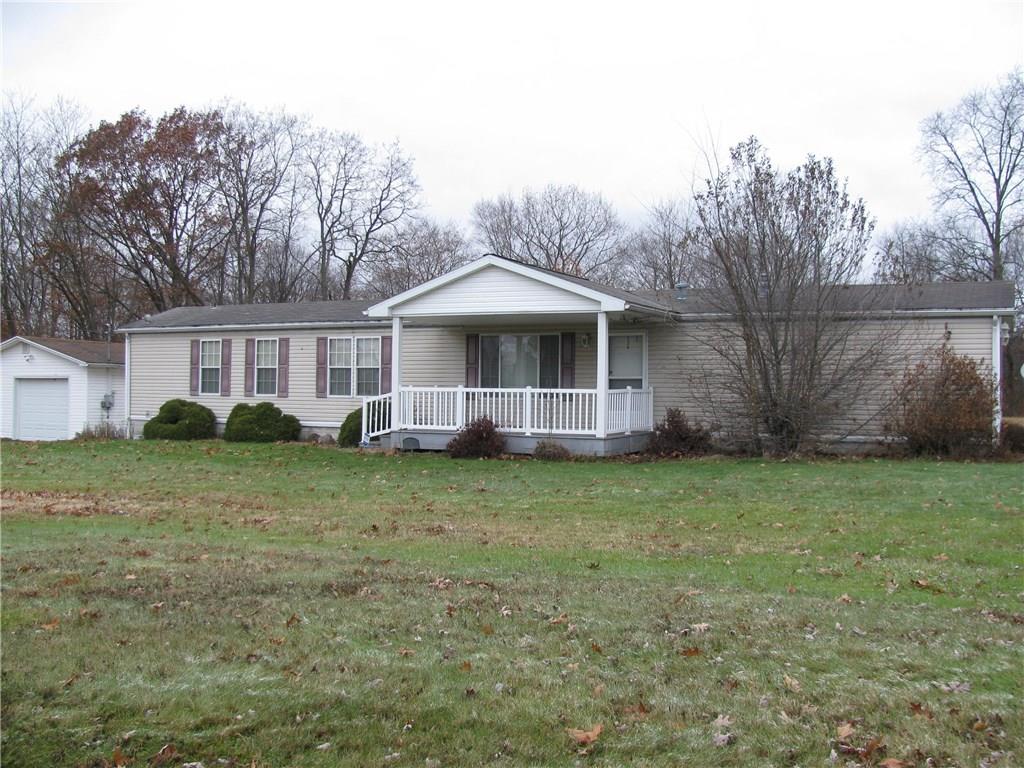1153 District Road Fredonia, PA 16124 - Photo 1 of 4 2 ACRE PARCEL DETACHED GARAGE. FRONT AND REAR PORCHES. NO CLOSE NEIGHBORS