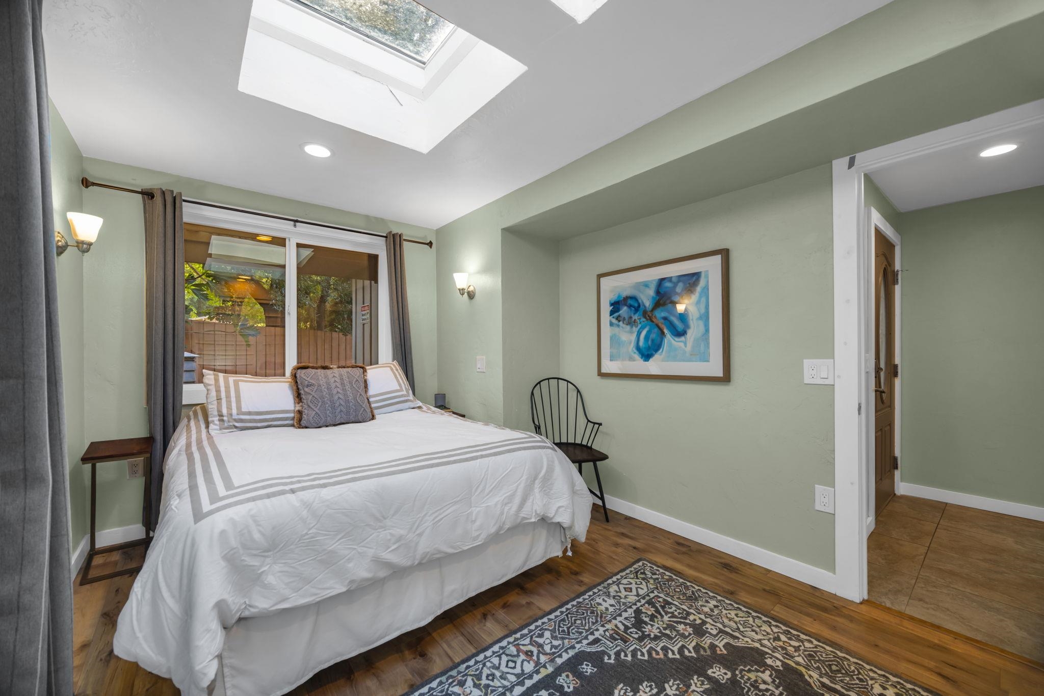 620 Awalau Road Haiku, HI 96708 - Photo 27 of 50 a bedroom with a bed and a window