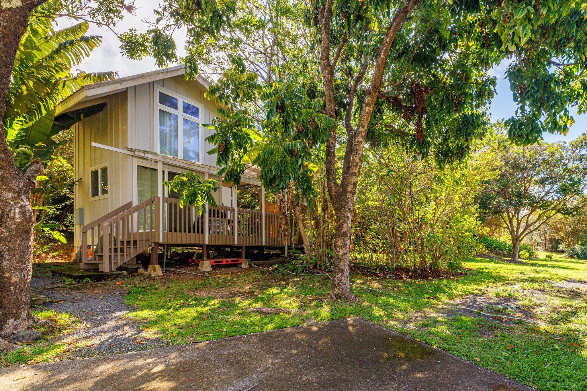 620 Awalau Road Haiku, HI 96708 - Photo 37 of 50 a front view of a house with a yard