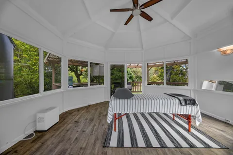 a view of outdoor space with deck and furniture