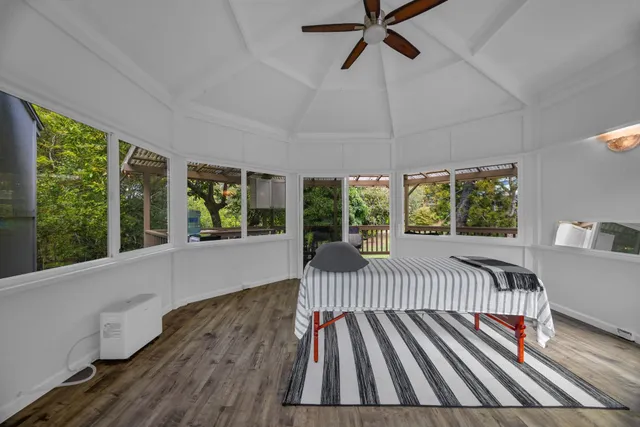 a view of outdoor space with deck and furniture