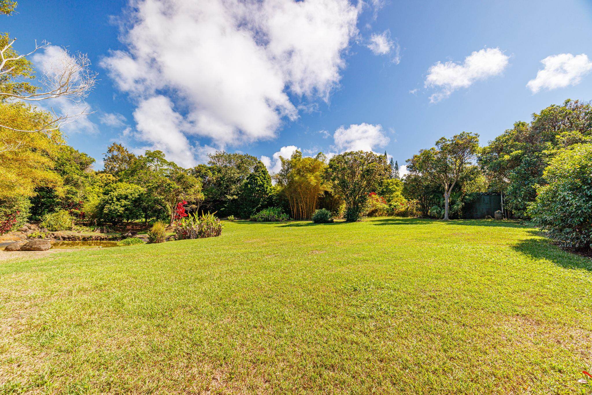620 Awalau Road Haiku, HI 96708 - Photo 47 of 50 a view of an ocean house and a yard